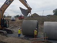 8’ RCP Installation on top of Culvert Bedding Stone Burrito